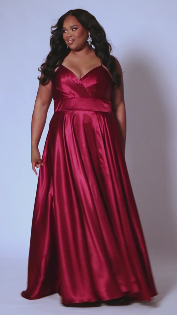 Sydney's Closet SC7355 A Line Satin Plus Size Prom Dress Slit V Neck Formal Gown Corset Color: Apricot, Lemon, Lime, Raspberry Size: 14-32 A-Line silhouette Spaghetti Straps Sweetheart neckline Lace-up back with modesty panel A-line skirt with slit Pockets Fully Lined