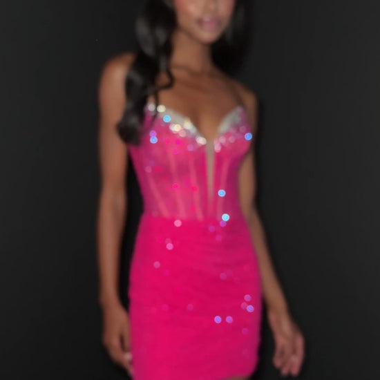 Elevate your evening with the Ashley Lauren 4877, a short fitted cocktail gown designed to captivate. Featuring a sheer crystal corset and a flattering V-neckline, this homecoming dress combines elegance with a modern edge. Its tailored silhouette enhances your figure, making it perfect for memorable occasions where sophistication is key.&nbsp;Shine bright in the ASHLEYlauren Style 4877, a dazzling press-on fabric mini dress featuring an ombre effect with beaded detailing on the bust and body. This sweethea