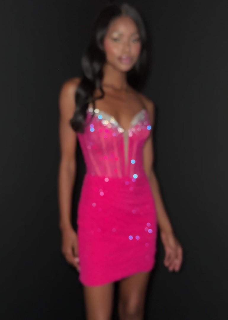Elevate your evening with the Ashley Lauren 4877, a short fitted cocktail gown designed to captivate. Featuring a sheer crystal corset and a flattering V-neckline, this homecoming dress combines elegance with a modern edge. Its tailored silhouette enhances your figure, making it perfect for memorable occasions where sophistication is key.&nbsp;Shine bright in the ASHLEYlauren Style 4877, a dazzling press-on fabric mini dress featuring an ombre effect with beaded detailing on the bust and body. This sweethea