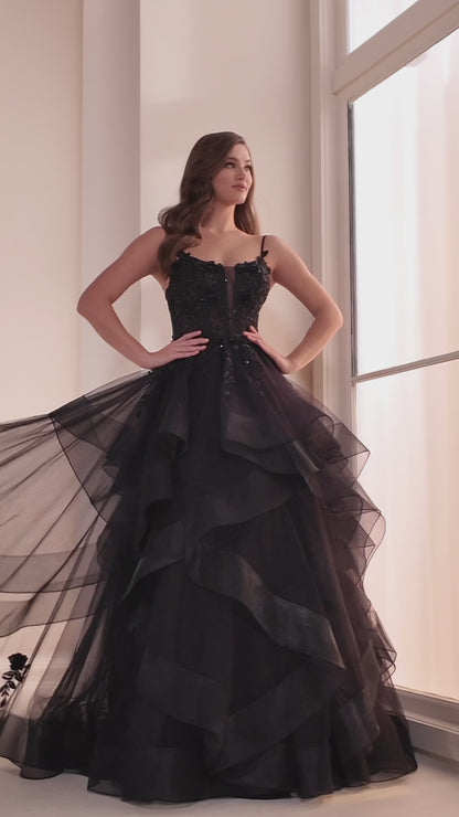 Step into elegance with the Ellie Wilde EW36225 Sheer Lace Corset Ball Gown. Featuring a stunning sheer lace bodice and layered corset, this formal evening gown is perfect for prom or any special occasion. Make a statement in this luxurious and exclusive dress, designed to make you feel like a work of art.