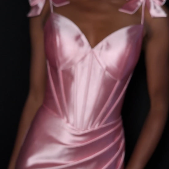 Ashley Lauren 12239 Prom Dress Bows. Step into the spotlight in this romantic shimmer jersey gown complete with oversized bow detailed straps, a sweetheart neckline, and flattering wrap skirt. ASHLEYlauren Style 12239 has a fitted silhouette that hugs your curves before flowing into a soft, elegant skirt with sweep train.