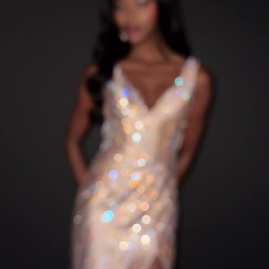 Make a statement in ASHLEYlauren Style 12253. This fully beaded evening gown features a flattering v-neckline and fitted silhouette. The heat set stone pattern creates a stunning swirl effect that accentuates your curves. The look is finished with a high slit and low open back for added drama.

Available in Champagne, Emerald, Gold, Ocean, Pink, Purple, Red, Royal
Ideal for Prom, Formal Galas, Special Occasions, Pageant Competitions and Red Carpet Events.
Featuring a V-Neckline, High Slit, and Open Back

As
