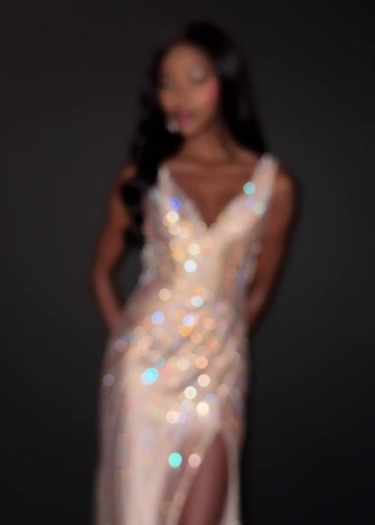 Make a statement in ASHLEYlauren Style 12253. This fully beaded evening gown features a flattering v-neckline and fitted silhouette. The heat set stone pattern creates a stunning swirl effect that accentuates your curves. The look is finished with a high slit and low open back for added drama.

Available in Champagne, Emerald, Gold, Ocean, Pink, Purple, Red, Royal
Ideal for Prom, Formal Galas, Special Occasions, Pageant Competitions and Red Carpet Events.
Featuring a V-Neckline, High Slit, and Open Back

As
