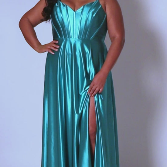This elegant Sydneys Closet SC7380 Long Prom Dress is designed with a Plus Size V Neck silhouette, crafted from luxurious Satin. Featuring an A-Line corset bodice and long floor length skirt, this timeless Formal Gown is perfect for any special event or pageant. You're both gorgeous and glamorous when you wear this "Sweet in Satin" long formal gown to Prom 2024 or your next fancy evening event. 