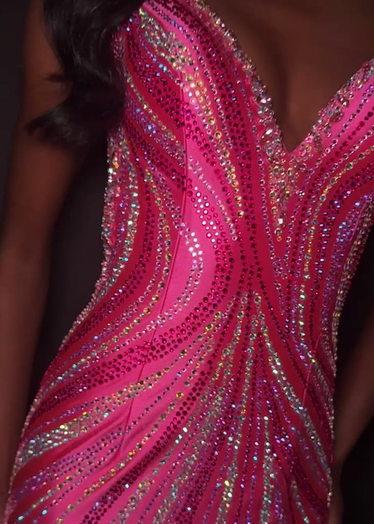 Make a statement in ASHLEYlauren Style 12253. This fully beaded evening gown features a flattering v-neckline and fitted silhouette. The heat set stone pattern creates a stunning swirl effect that accentuates your curves. The look is finished with a high slit and low open back for added drama.

Available in Champagne, Emerald, Gold, Ocean, Pink, Purple, Red, Royal
Ideal for Prom, Formal Galas, Special Occasions, Pageant Competitions and Red Carpet Events.
Featuring a V-Neckline, High Slit, and Open Back

As