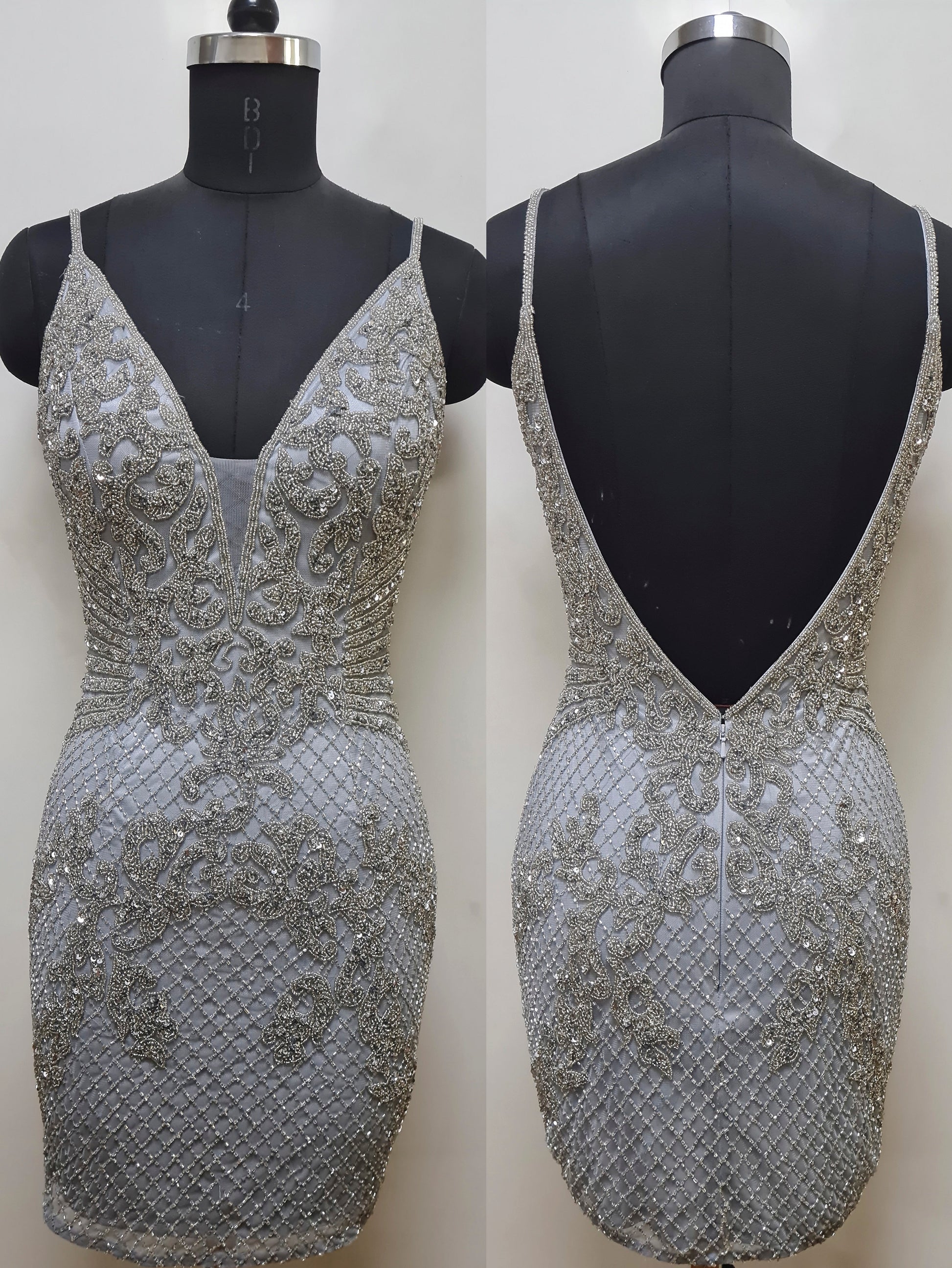 Primavera Couture 4012 Sequin And Beaded Net Design Embellished Bodice V-Neck And V-Back Homecoming Cocktail Dress. Make a statement with the Primavera Couture 4012 dress. Expertly beaded and sequined for an eye-catching sparkle, this v-necks and V-back homecoming dress is sure to shine. 