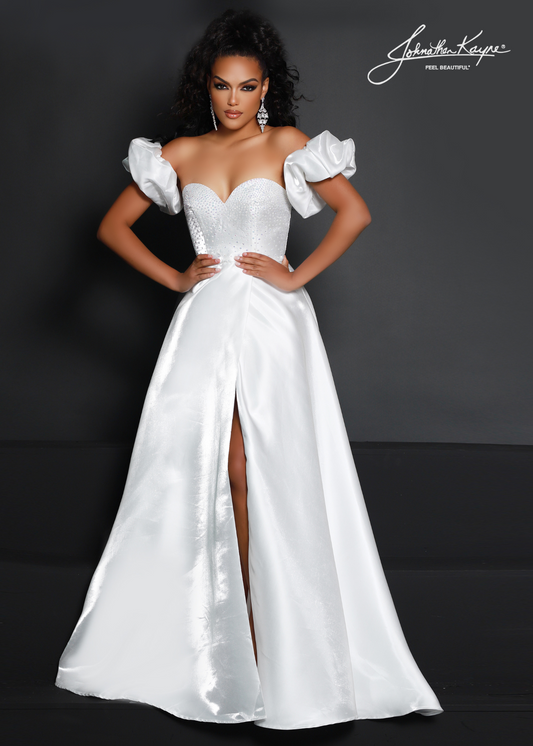 Make a statement in this Johnathan Kayne 2642 dress! Made of luxurious White Shimmer satin, its A-line silhouette and puff sleeves will have you looking fabulous for any formal occasion. With a high slit for extra pizzazz, you won't be able to resist this elegant maxi dress! Shake things up in style! Show off your style and sophistication in this beautiful shimmer satin A-line gown with removeable puff sleeves at any event  Size: 2  Color: White