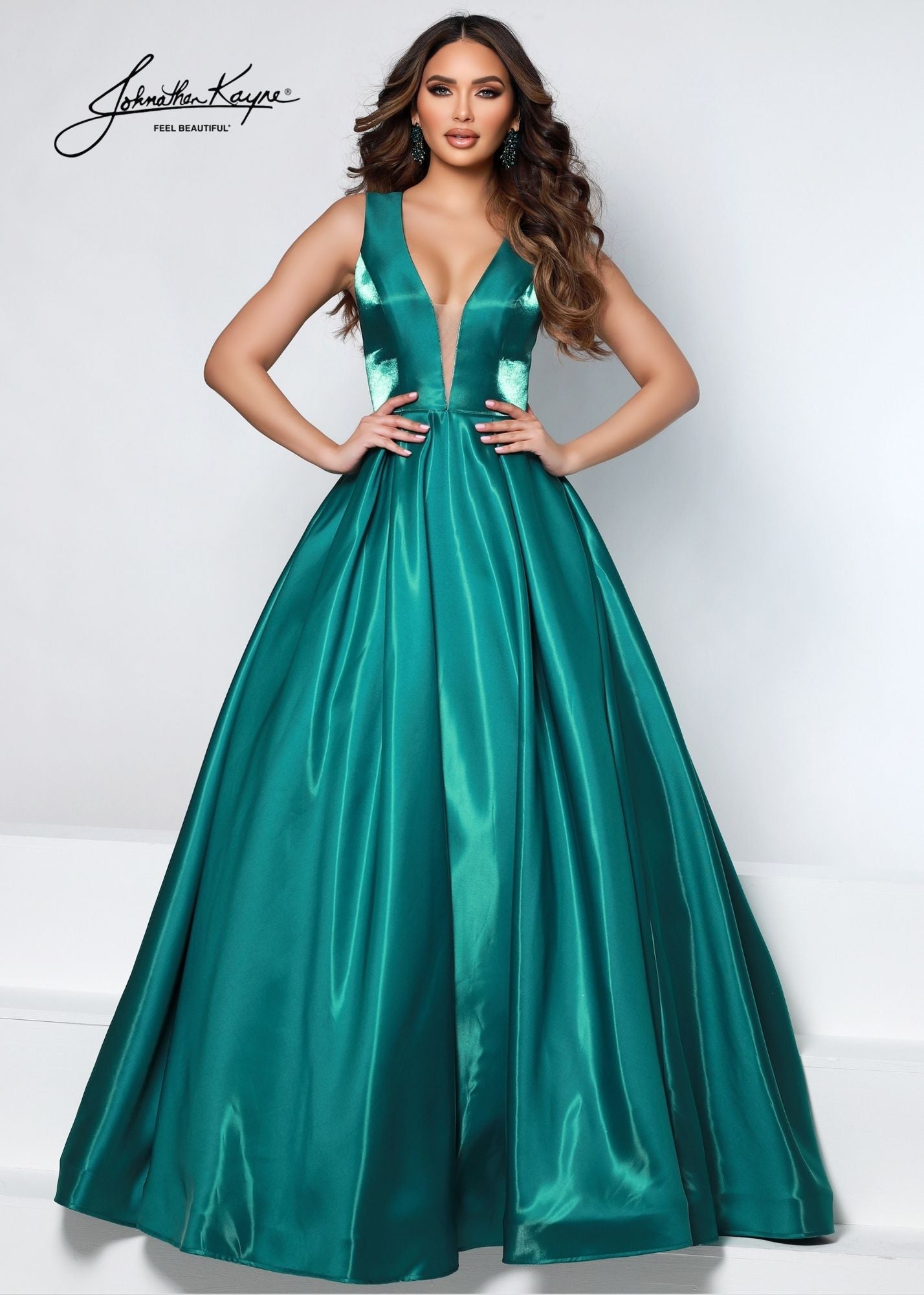 Johnathan Kayne 2550 Size 4 Royal A-Line Ballgown Satin Plunging Neckline Side Cut Outs Bows In Back Prom Gown. This elegant Johnathan Kayne 2550 Prom Gown is crafted in Royal satin fabric and features a classic A-line silhouette. It boasts a plunging neckline, side cut-outs and bows in the back for a luxurious look. Size 4.
