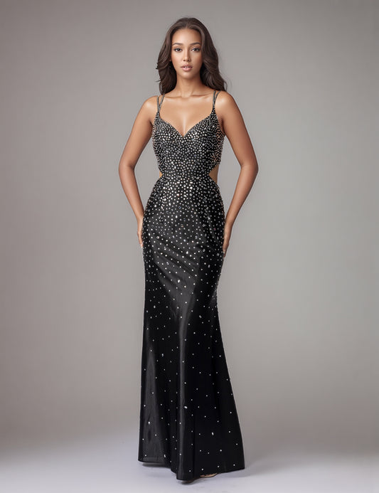 This Nina Canacci design showcases masterful construction with its signature cut glass mirror embellishments that deliver exceptional light refraction and visual depth. The mermaid silhouette provides a refined fit through the bodice and hips, transitioning into a graceful sweep. The backless cut demonstrates confident design, offering both architectural interest and modern elegance. Crafted for discerning customers who appreciate quality craftsmanship and timeless formal wear that commands attention.

Size