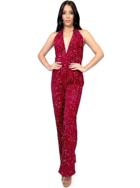 Look and feel fabulous in the Marc Defang 8049 Fuchsia Jumpsuit Fun Fashion Sequin Halter Pageant Wear. Crafted with sequins and a V neckline, the halter top is backless and designed to make a statement. Perfect for special occasions. Size 8. Overskirt not included.  Size: 8  Color: Fuchsia