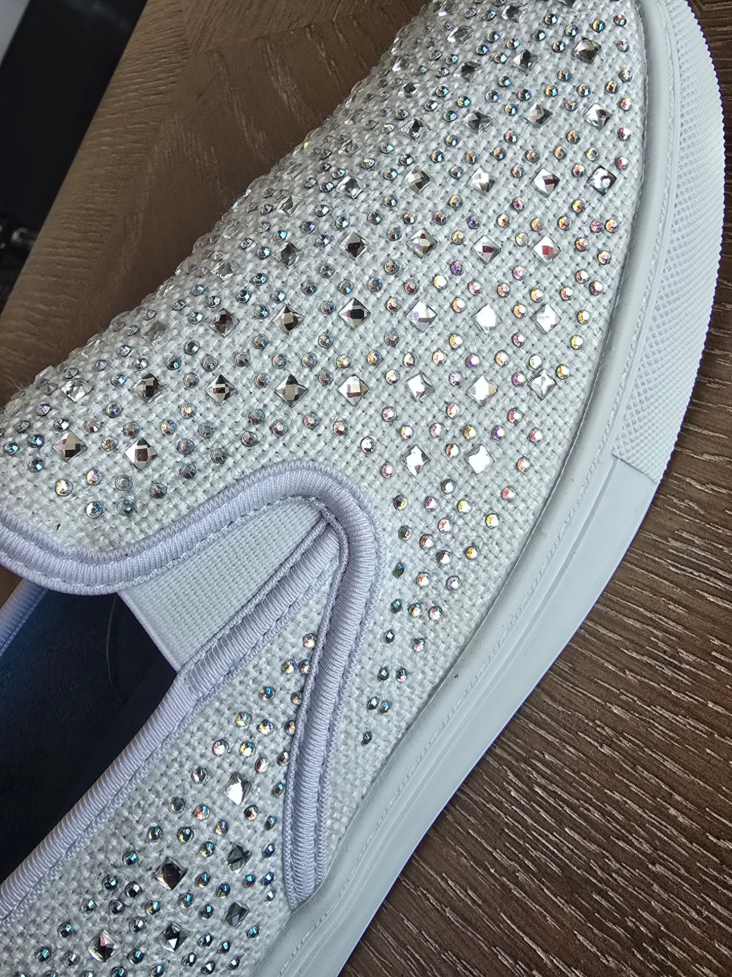 Your Party Shoes - Peyton These Flat Slip On Canvas Sneakers are embellished with Rhinestones &amp; Crystal For Comfort yet all the glam you want for prom, Homecoming or any Special Occasion! Great vans style Bling crystal embellished comfortable formal sneakers. Stretch canvas upper with rhinestones embellishments scattered across. Great option for a wedding reception shoe in White/Ivory!


