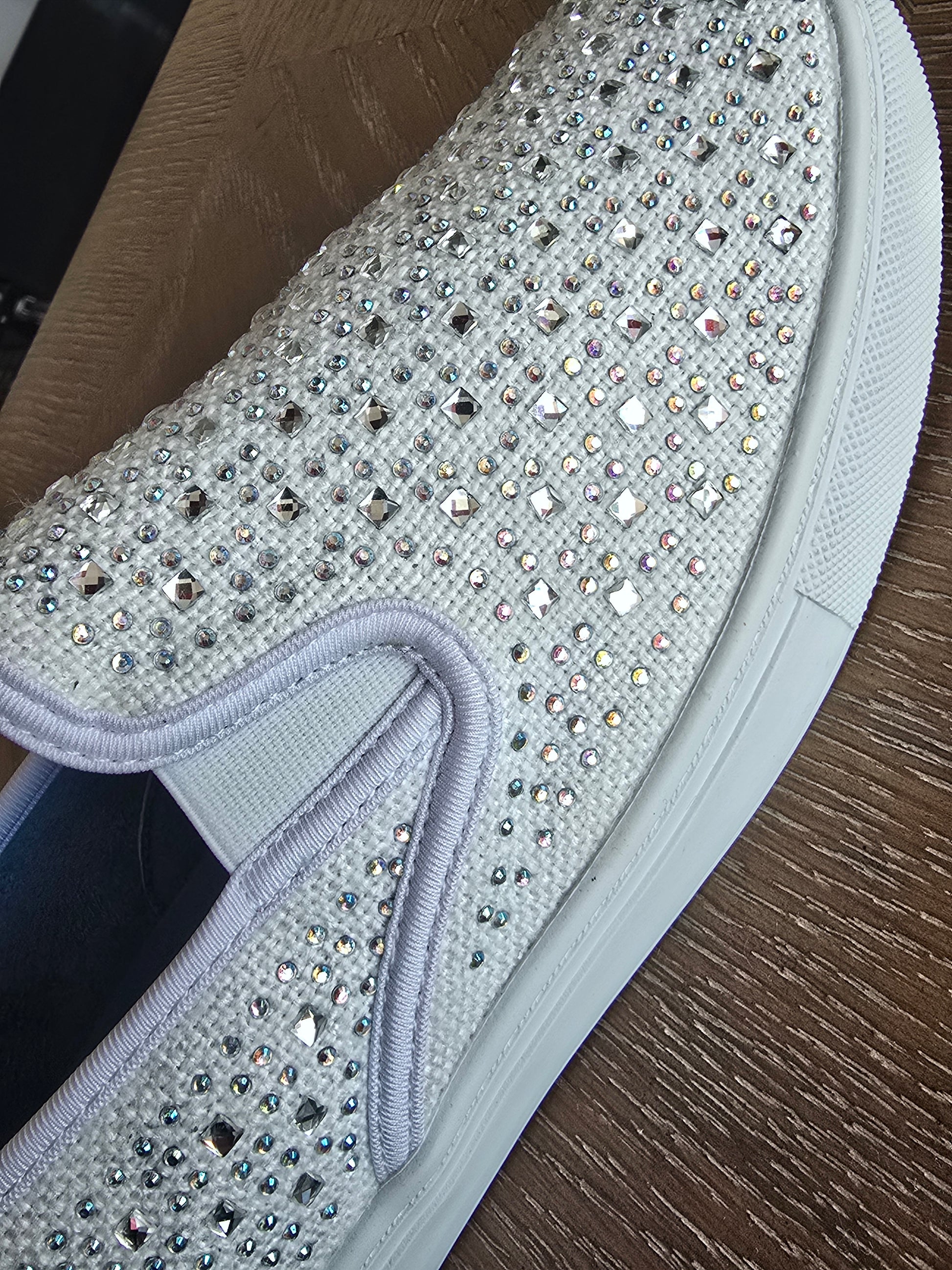 Your Party Shoes - Peyton These Flat Slip On Canvas Sneakers are embellished with Rhinestones &amp; Crystal For Comfort yet all the glam you want for prom, Homecoming or any Special Occasion! Great vans style Bling crystal embellished comfortable formal sneakers. Stretch canvas upper with rhinestones embellishments scattered across. Great option for a wedding reception shoe in White/Ivory!


