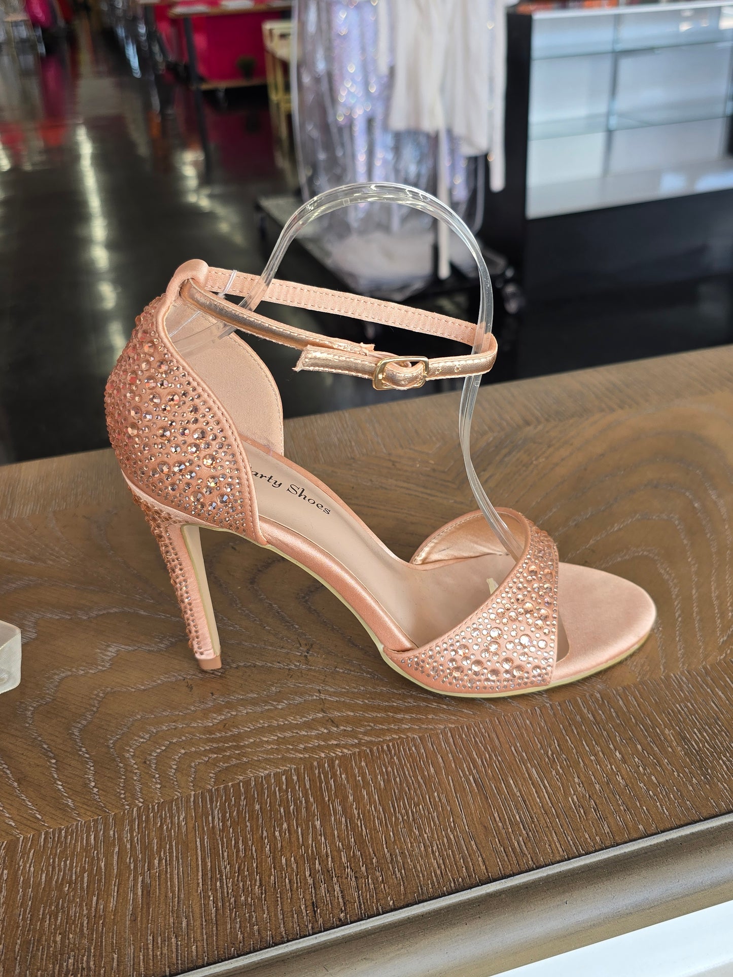 Your Party Shoes style Carley is a sexy Crystal Embellished Formal evening Heel with a feminine soft organza ribbon that ties into a bow at the ankle. Don't let this shoe fool you! not only does it feature a fun organza bow/ankle wrap. These also come with an extra set of adjustable vinyl straps for a traditional ankle wrap look! Final Sale



Heel Height: 3 1/2"
Platform Height: 1/2"


Available in Colors: Rose Gold


