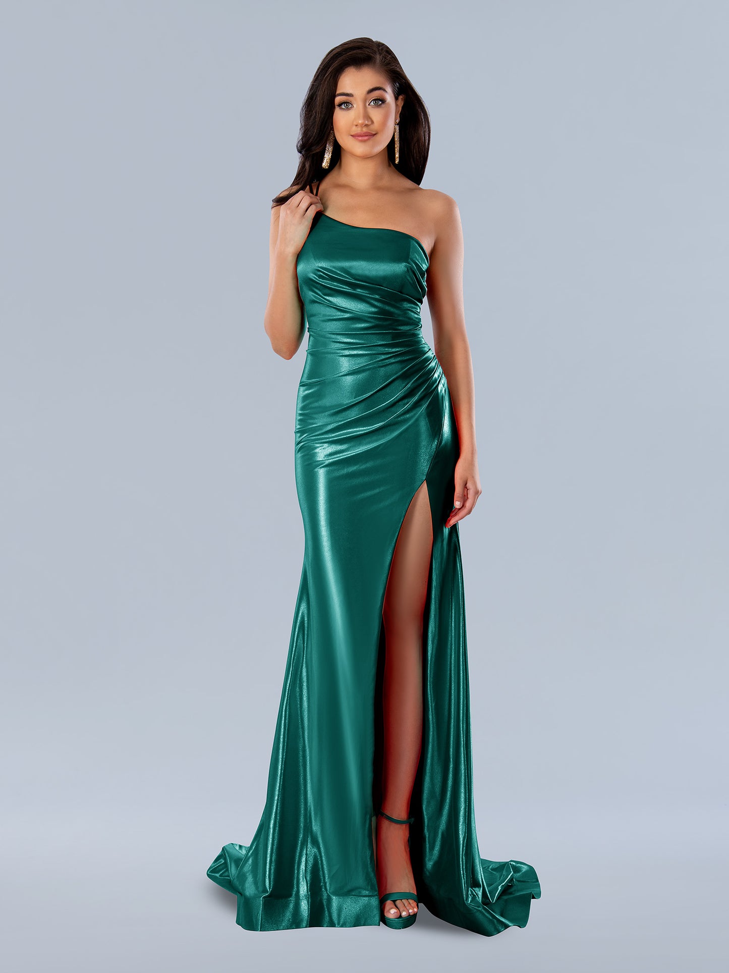 The epitome of timeless elegance, Stella Couture 24205 is a long fitted one shoulder formal dress. The Ruched satin gown features a flattering corset back and a generous high slit, perfect for making a statement. A must-have for special occasions.  Sizes: 0-16  Colors: Orange, Green, Royal