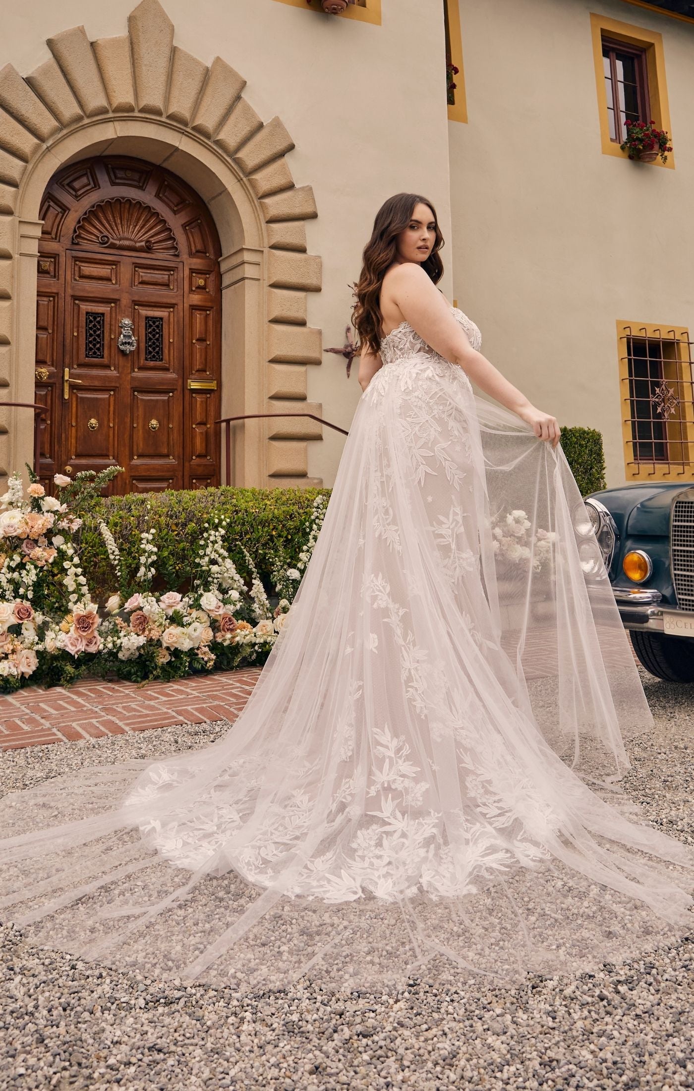 Casablanca Bridal 2548 Jacqueline A-Line Ballgown Off The Shoulder Sheer Floral Tulle Appliques Train Wedding Dress. An A-Line skirt matching style 2548-1 made of tulle with sequined floral lace delicate trim at the waistline.