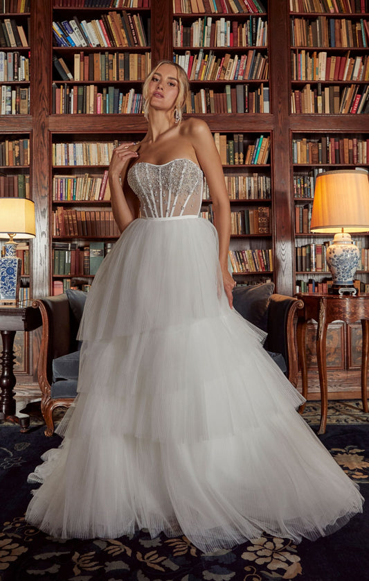 Casablanca Bridal 2558 Jewel A-Line Ballgown Strapless Sheer Corset Sweetheart Neckline Tulle Tier Train Wedding Gown. Step into a world of timeless glamour with our stunning A-line wedding dress, Style 2558 Jewel. This exquisite gown is designed to make you feel like a true jewel on your special day, radiating elegance and grace. The strapless, modified sweetheart neckline of Jewel beautifully frames your face and shoulders, creating a romantic and feminine silhouette.