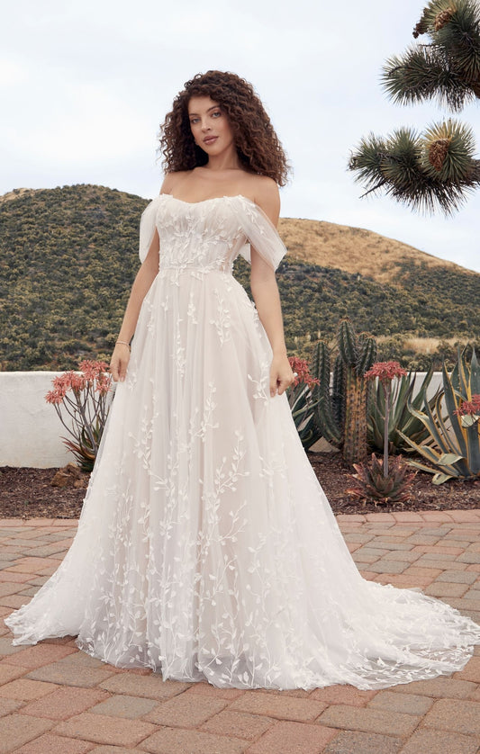 Casablanca Beloved A-Line Off The Shoulder Sweetheart Neckline Tulle Train Wedding Gown. Indulge in the ethereal elegance of Style BL428 Calico, a gown designed to transport you to a world of enchantment on your special day. The A-line silhouette and modified strapless sweetheart bodice of Calico exude timeless beauty and sophistication. The detachable off-the-shoulder sleeves add versatility, allowing you to create different looks to suit your style and mood.