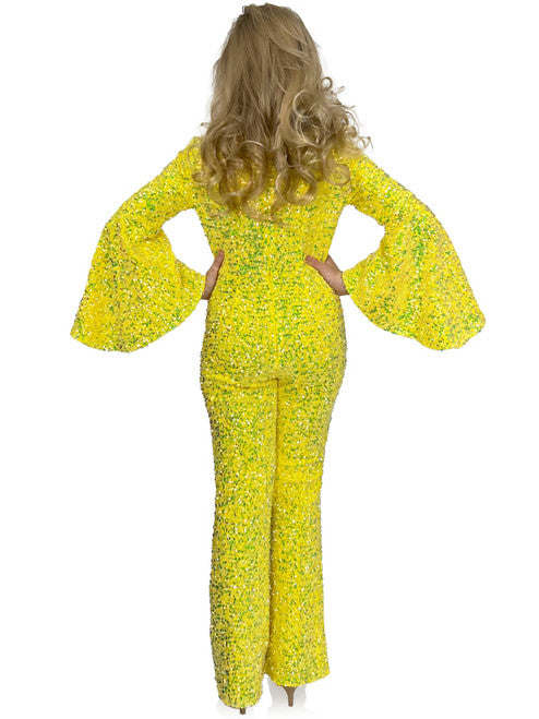Inject a bit of sparkle and glamour into special occasions with Marc Defang's 8225K Girls Velvet Sequin Pageant Jumpsuit. This jumpsuit features a high neck with long bell sleeves and is finished with a beautiful sequin design for an eye-catching effect. Perfect for pageants and special occasions.  Sizes:  4,5,6,7,8,9,10,11,12,13,14  Colors: Yellow, White AB, Royal, Hot Pink, Purple, Light Blue, Light Pink, Neon Green, Lilac