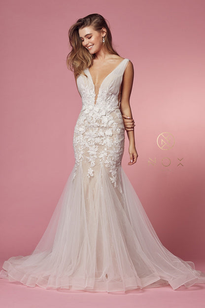Nox Anabel JE917 3D Floral Lace Mermaid Wedding Dress Bridal Gown Boho Train  Floral Applique Mermaid Bridal Gown by Nox Anabel JE917 Sleeveless deep illusion V-neck bodice and sheer sides Open back Floor length fitted skirt with sweep train Details: Bra Cup, Fully Lined Fit: The model is 5'8" and is wearing 4" heels Colors: White/Nude Sizes: 4 to 16