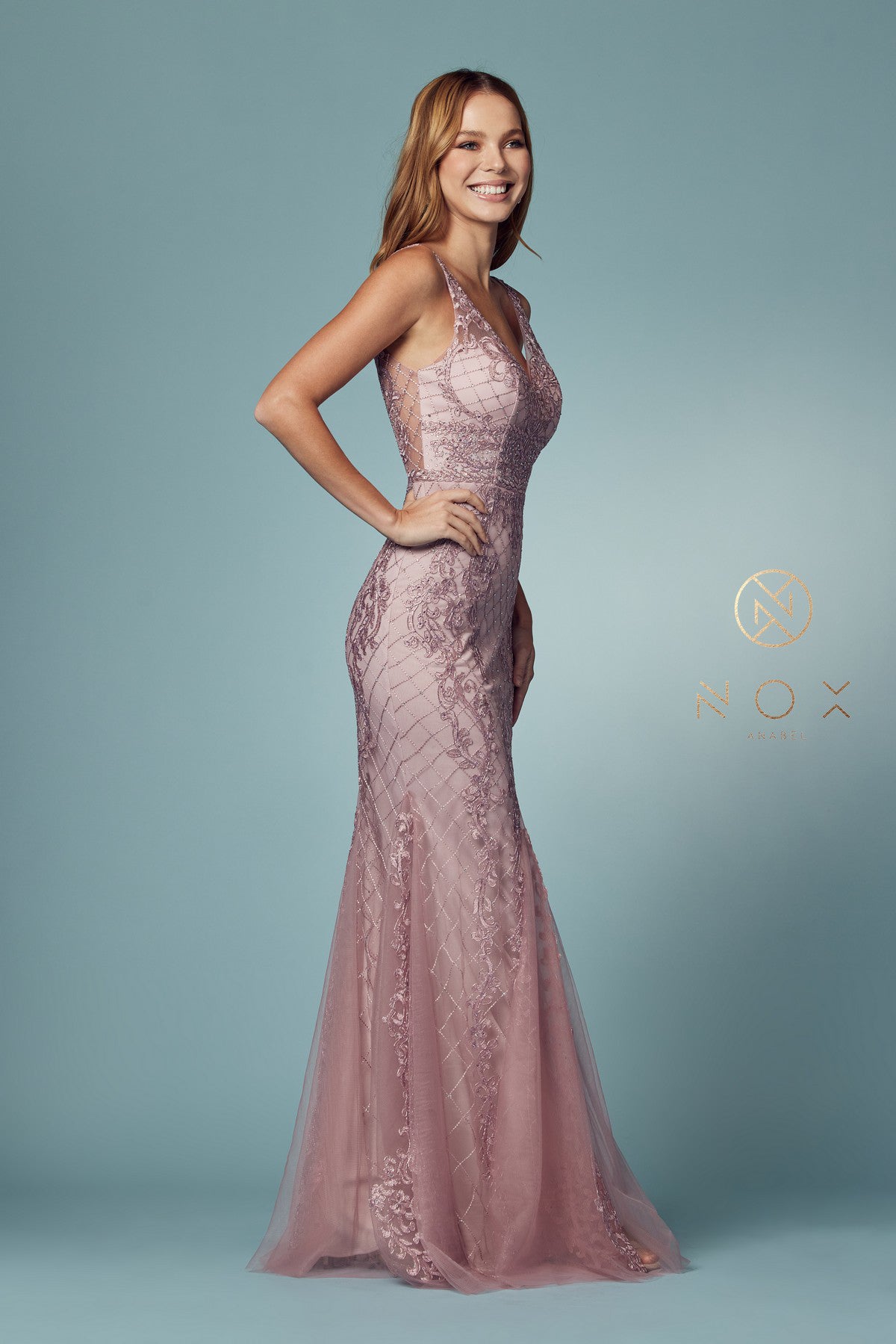 Nox Anabel A398 Long Embellished Lace Formal Evening Gown Prom Dress Wedding Guest Fulfill your wish to look like a princess with this long mermaid dress. The full-length dress comes with a deep V-neck design and an open back which makes it an excellent attire to wear at a party. The front and back have alluring embroidery  Available Sizes: 2-16  Available Colors: Burgundy, Gold, Navy Blue, Rose, Black, Lemon, Light Blue, Green