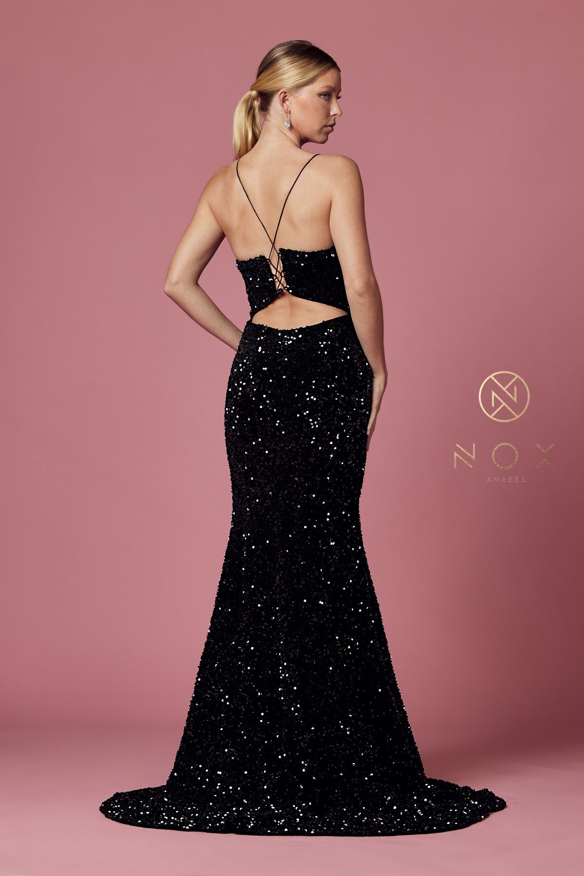 Nox Anabel R433 Long Fitted Velvet Sequin Prom Dress Formal Slit V Neck Corset  PLUNGING NECKLINE FITTED BODICE VELVET SEQUENCE TRUMPET SKIRT An absolutely glamorous piece by NOX ANABEL is for a classy lady who is all about the details. This relaxed fit-and-flare silhouette features a soft sweetheart plunge neckline and spaghetti straps for an elegant and universally flattering shape—Shinny silhouette with sequins incorporated throughout the sheer bodice for a hint of shimmer.