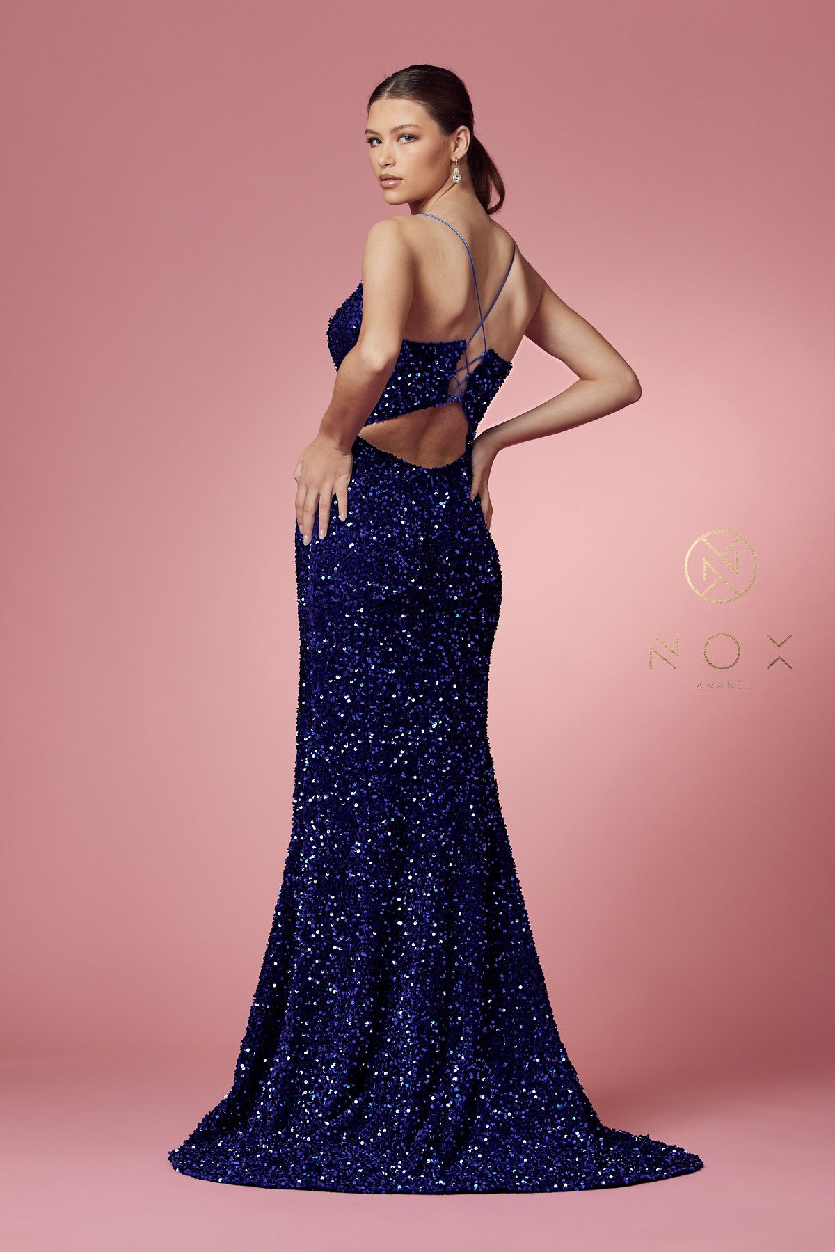 Nox Anabel R433 Long Fitted Velvet Sequin Prom Dress Formal Slit V Neck Corset  PLUNGING NECKLINE FITTED BODICE VELVET SEQUENCE TRUMPET SKIRT An absolutely glamorous piece by NOX ANABEL is for a classy lady who is all about the details. This relaxed fit-and-flare silhouette features a soft sweetheart plunge neckline and spaghetti straps for an elegant and universally flattering shape—Shinny silhouette with sequins incorporated throughout the sheer bodice for a hint of shimmer.