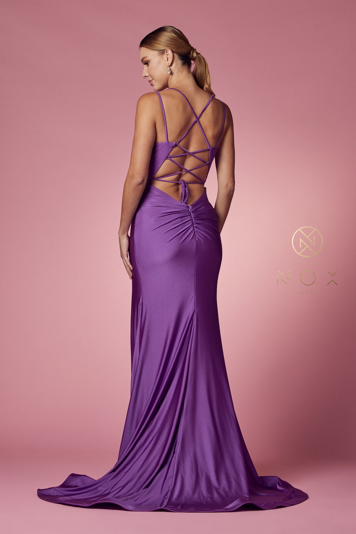 Nox Anabel T481 Long Fitted Jersey Prom Dress Backless Corset Slit Formal Gown Train Sleek and chic with a lightweight feel, this gorgeous scoop neck with spaghetti straps fitted gown by NOX ANNABEL is as cool as it is comfortable. Available Colors: Dusty Rose, Fuchsia, Lavender, Neon Orange, Black, Red, Sunflower, Iris