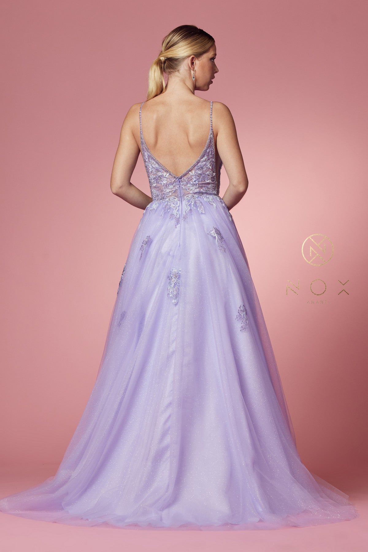 Nox Anabel T1012 Lilac Prom Dress.  DEEP V NECKLINE WITH MESH AND SIDE OPENED WITH MESH, BEAUTIFUL SHOULDER LINE CONNECTED TO THE BODICE, FLOWERS EMBELLISHMENT COVERED BOTH FRONT AND BACK.