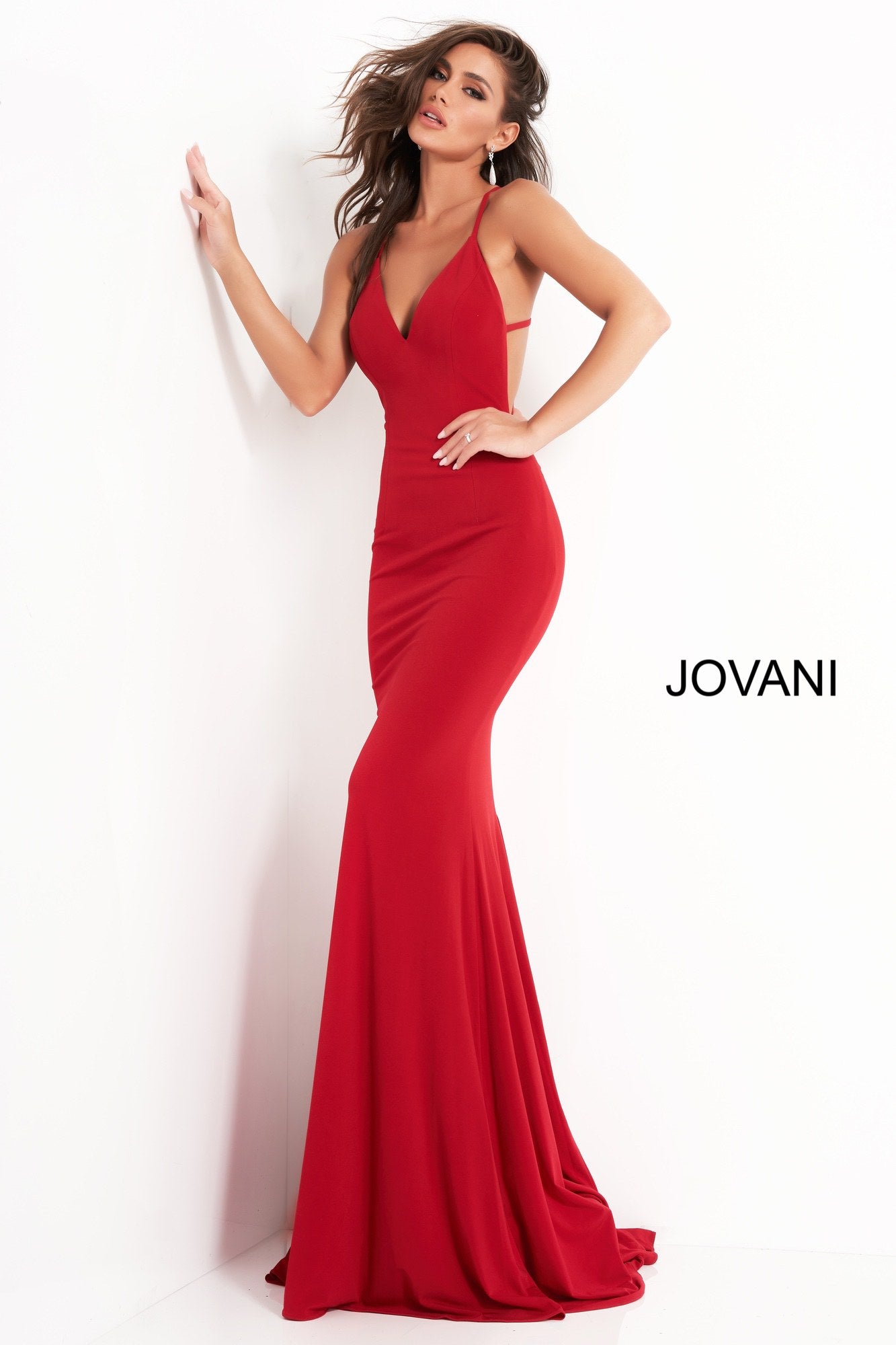 Jovani 00512 plunging v neckline fitted mermaid prom dress evening gown pageant dress has an open back with multiple straps that cross to create a dramatic effect.  Ruching at the lower back to give a little extra lushness and a small sweeping train.   Available colors:  Black, Blush, Burgundy, Red, Navy, Sage  Available sizes:  00, 0, 2, 4, 6, 8, 10, 12, 14, 16, 18, 20, 22, 24  Prom Dress, Pageant Gown, Evening Gown, Gala Dress 