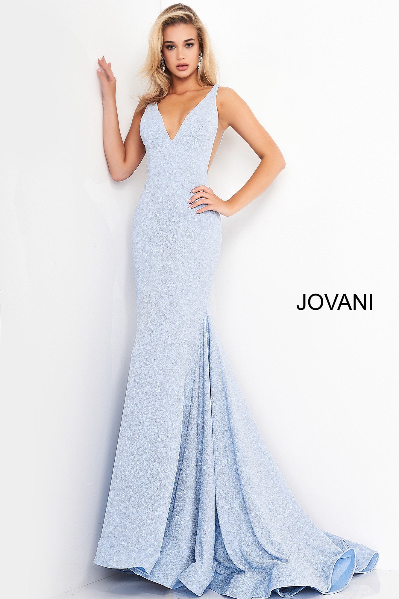 Jovani 02132 Blue V Neck Jovani Prom Dress 02132 Long Sexy Fitted Mermaid Prom Dress, Deep V Plunging Neckline with a Fit & Flare Shape Leading to a lush trumpet skirt with horse hair trim. Stretch Glitter fabric adds a touch of glam and a comfortable wear all night long!  Available Sizes: 00-24  Available Colors: blue, champagne, orange, pink