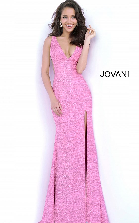 Jovani 02472 is a long Fitted Prom, Pageant & Formal Evening dress. Featuring a Stretch Glitter jersey material for a touch of shimmer. V Neckline and open v back. sheer side cutout panels. slit in the skirt and small sweeping train.  Available Colors: black/gold, black/multi, gunmetal, hot-pink, jade, red, royal, soft blue/silver  Available Sizes: 00,0,2,4,6,8,10,12,14,16,18,20,22,24