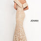 Jovani 02923 Floor length form fitting sequin embellished gold lace evening dress features off the shoulder bodice with fold over V neck and back zipper. The long column skirt has a small brush train.  Formal Evening Wear Gown, Mother of the Bride or Groom Dress.