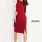 Jovani 02949 Knee length form fitting burgundy crepe evening dress features three quarter sleeve bodice with pleated tie front with brooch and off the shoulder neck.  Ruching and broach at the waistline and small slit in back. Formal Evening Cocktail Wear Dress, Wedding Guest Dress.