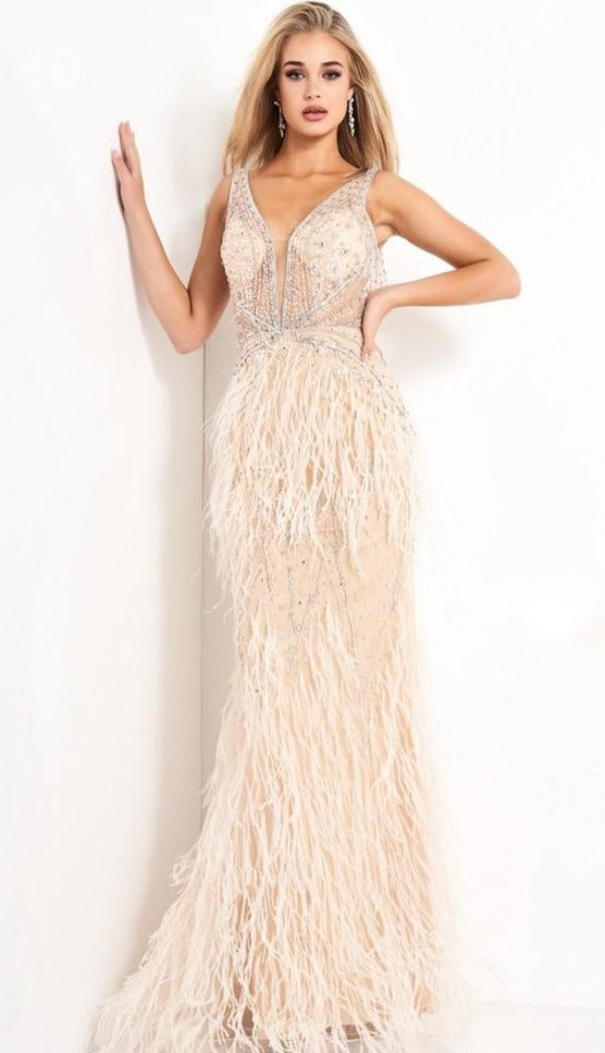 Jovani 03023 is a Long Feather Prom Dress, Pageant Gown, Wedding Dress & Formal Evening wear. This Sheer embellished bodice features a plunging v neckline with beading & crystal accents cascading through a feather embellished skirt. Very stunning and unique wedding dress! 