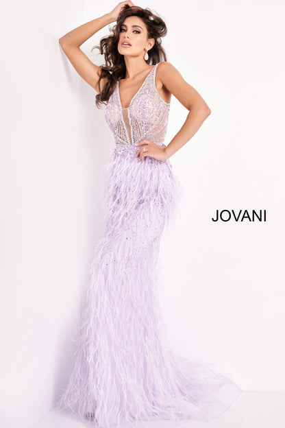Jovani 03023 is a 2021 Prom Dress, Pageant Gown, Wedding Dress & Formal Evening wear. This Sheer embellished bodice features a plunging v neckline with beading & crystal accents cascading through a feather embellished skirt. Very stunning and unique wedding dress!   Available Colors: Off White, Blush, Black  Available Sizes: 00-24