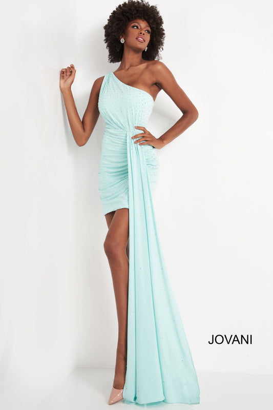 Jovani 04153 is a short fitted one shoulder cocktail dress. Embellished with scattered crystal rhinestones, Ruched shoulder & ruching leading up to the long draped sash along the hip. crystal accents disperse as they fall down the train. Great for any formal event!  Prom, Pageant and Evening Formal Wear Cocktail Dress.   Colors: Mint  Size:  4