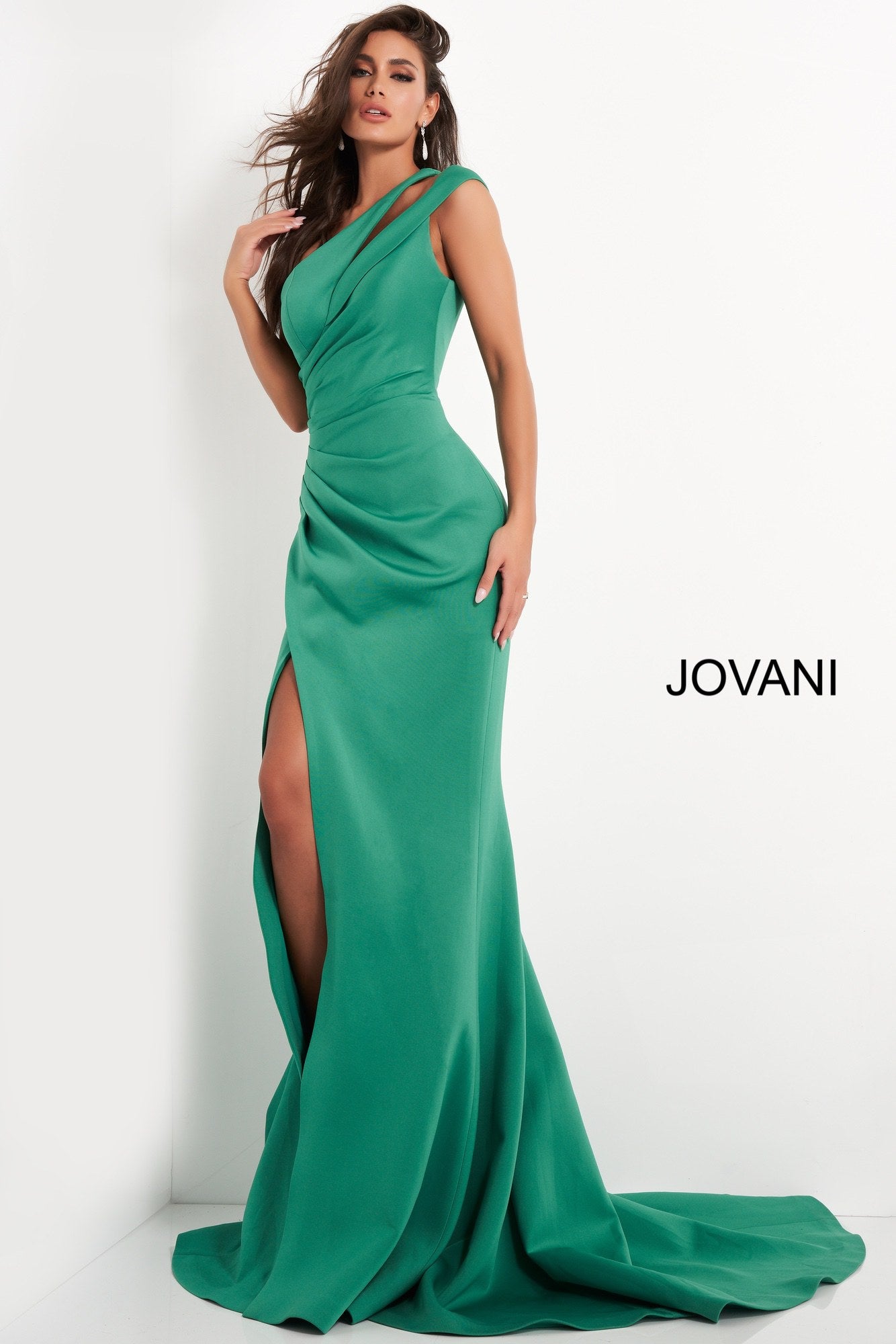Jovani 04222 This long Jovani evening gown has a double one shoulder strap with a cutout.  This prom and pageant dress has full ruching down the front of the gown giving away to a side slit and long train.   Colors   Black, Green, Light Blue, Navy, Tomato, Wine  Sizes:  00-24 
