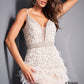 Jovani 04624 is a short fitted formal cocktail dress. Featuring a Plunging V Neckline with A Beaded & Embellished bodice and Crystal rhinestone waist belt lines. Elegant Feathers accent the hips and short skirt. Great for a wedding reception or Red Carpet Gown! Versatile enough for Prom, Homecoming & More! Glass Slipper Formals