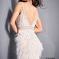 Jovani 04624 is a short fitted formal cocktail dress. Featuring a Plunging V Neckline with A Beaded & Embellished bodice and Crystal rhinestone waist belt lines. Elegant Feathers accent the hips and short skirt. Great for a wedding reception or Red Carpet Gown! Versatile enough for Prom, Homecoming & More! Glass Slipper Formals