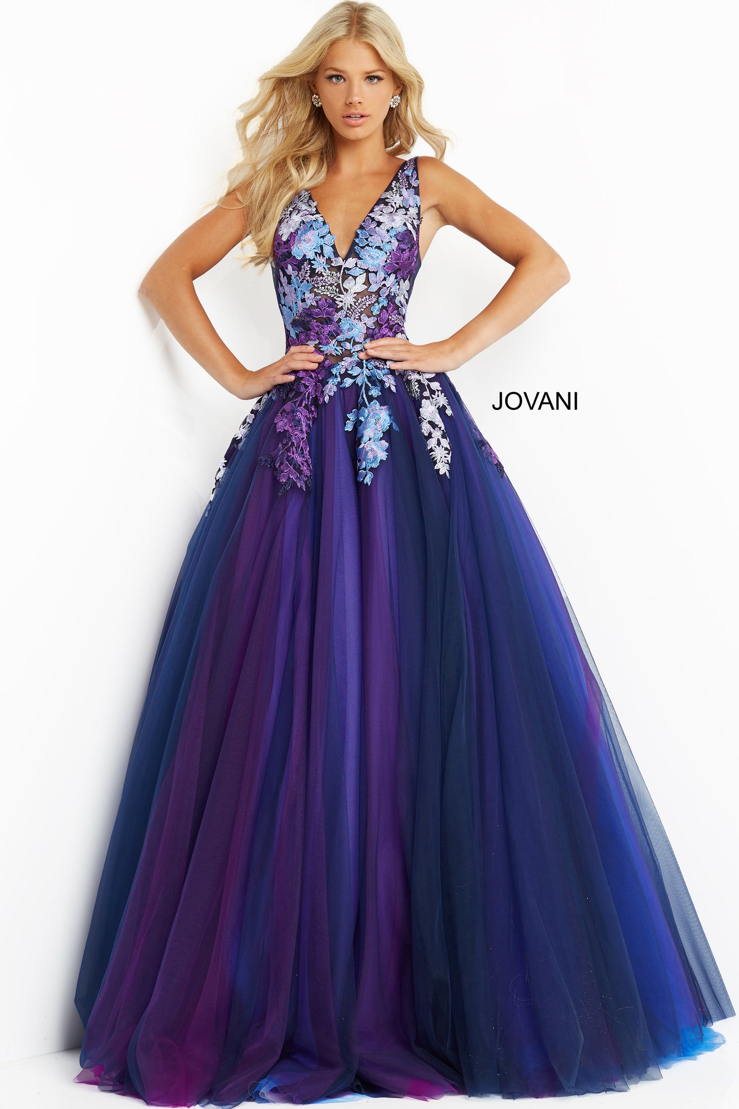 Jovani 06807 Navy Multi Long Ballgown Prom Dress. Floor length navy multi Jovani prom ballgown 06807 features floral embroidered sleeveless bodice with plunging V neck and open back.
