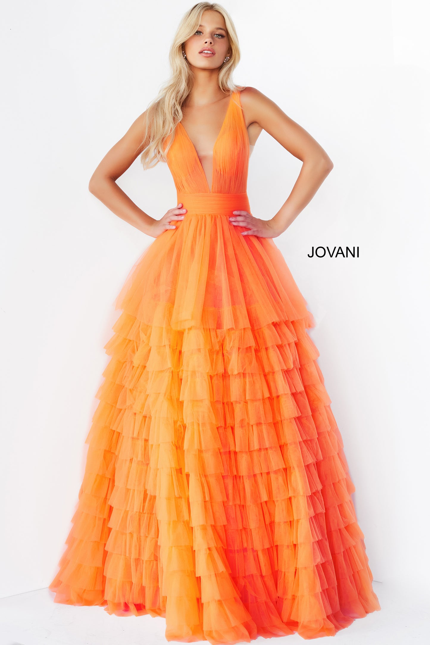 Jovani 07264 Long Ballgown Prom Pageant Gown ruffle dress v neck Floor length A line orange tulle Jovani prom ballgown 07264 features layered skirt and pleated sleeveless bodice with low V neck and open back. Available Size-00-24  Available Color- Orange, Blush, Lilac, White