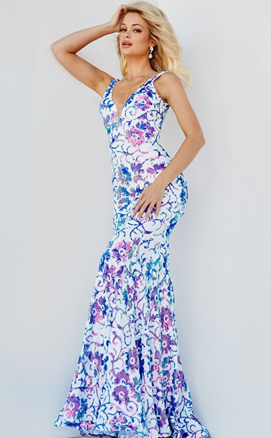 Jovani 08527 is a stunning formal prom & pageant dress. Featuring a floral design in sequin accents. Plunging V neckline. Lush sweeping train & Open midrise back. Great Gown for any formal event! This gown reveals a mermaid silhouette lavishly studded with floral sequin embellishment throughout finished with a sweep train.   Available Sizes: 16  Available Colors: IVORY/PURPLE