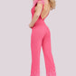 Jovani 08554 Shimmer Jumpsuit Feather Pant Legs Slit V Neck Formal Pageant Wear This Jovani 08554 hot pink contemporary jumpsuit features a fitted silhouette in glitter stretch, accented with ostrich feathers on the shoulders and hem.  Available Sizes: 00,0,2,4,6,8,10,12,14,16,18,20,22,24  Available Colors: Black, Hot Pink
