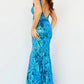 Jovani 08646 Long Iridescent Sequin Fitted Sequin Backless Mermaid Formal Prom Dress Pageant  V neckline with sheer mesh sides. open V Back.  Available Sizes: 00-24  Available Colors: Iridescent Royal, Hot Pink