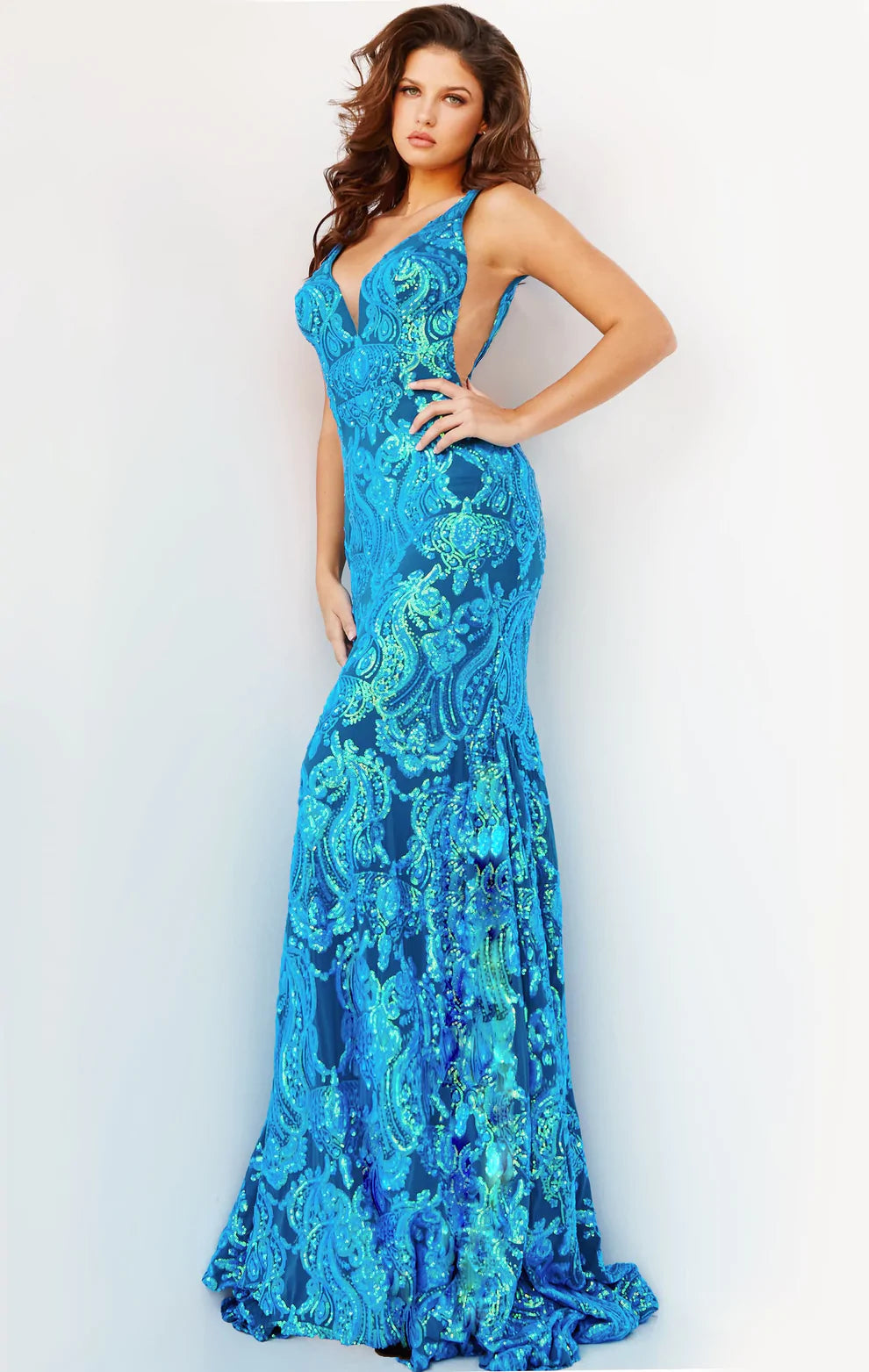 Jovani 08646 Long Iridescent Sequin Fitted Sequin Backless Mermaid Formal Prom Dress Pageant  V neckline with sheer mesh sides. open V Back.  Available Sizes: 00-24  Available Colors: Iridescent Royal, Hot Pink