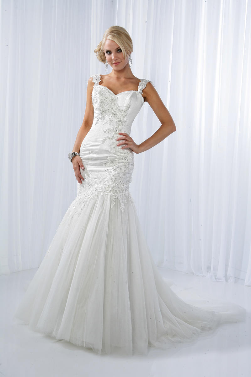 Impression Wedding Dress style 10095. Tulle lace satin dress with lace applique shoulder straps, sweetheart neckline adorned with beaded applique throughout the dress, fit and flare silhouette tulle skirt extend to a chapel length train. removable straps  Available in Size 2 Ivory