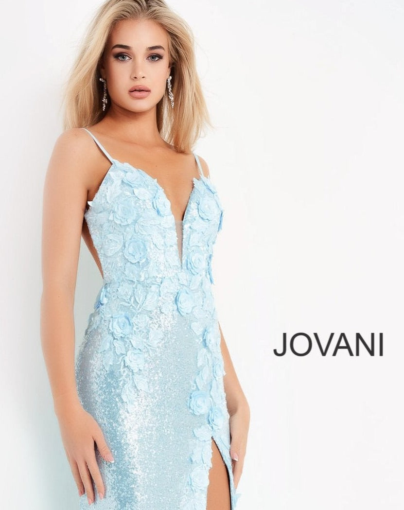 Jovani 1012 is a Delicate all over sequin Embellished Prom Dress with Floral Appliques. Features a plunging neckline & Slit in the skirt. Small Train in Back.  Light Blue