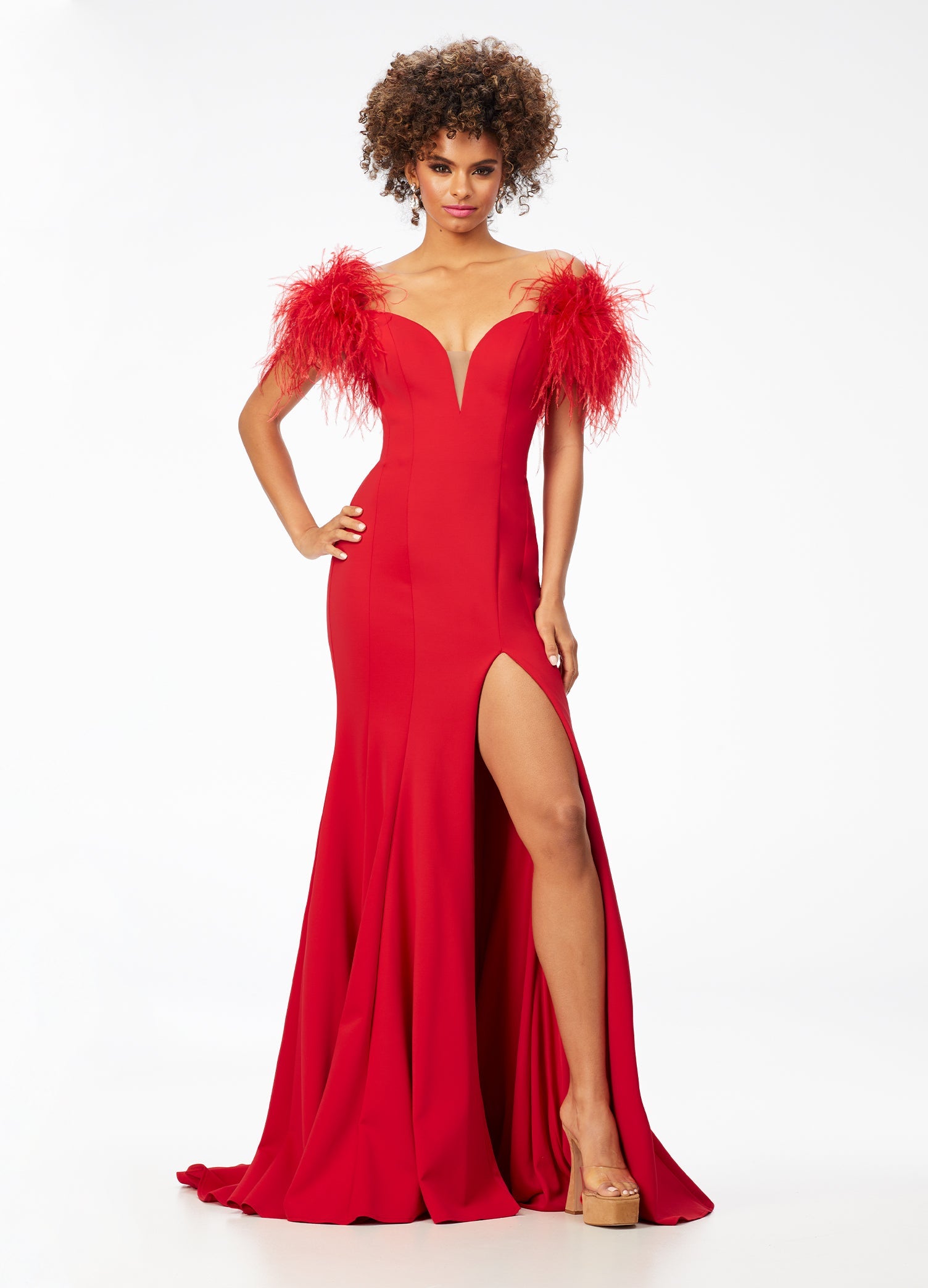 Ashley Lauren 11100 Feather trimmed Jumpsuit. This jumpsuit features a feather boa wrapped around your neckline, arms and back.  The fabric is scuba and it has flare in the pant leg.