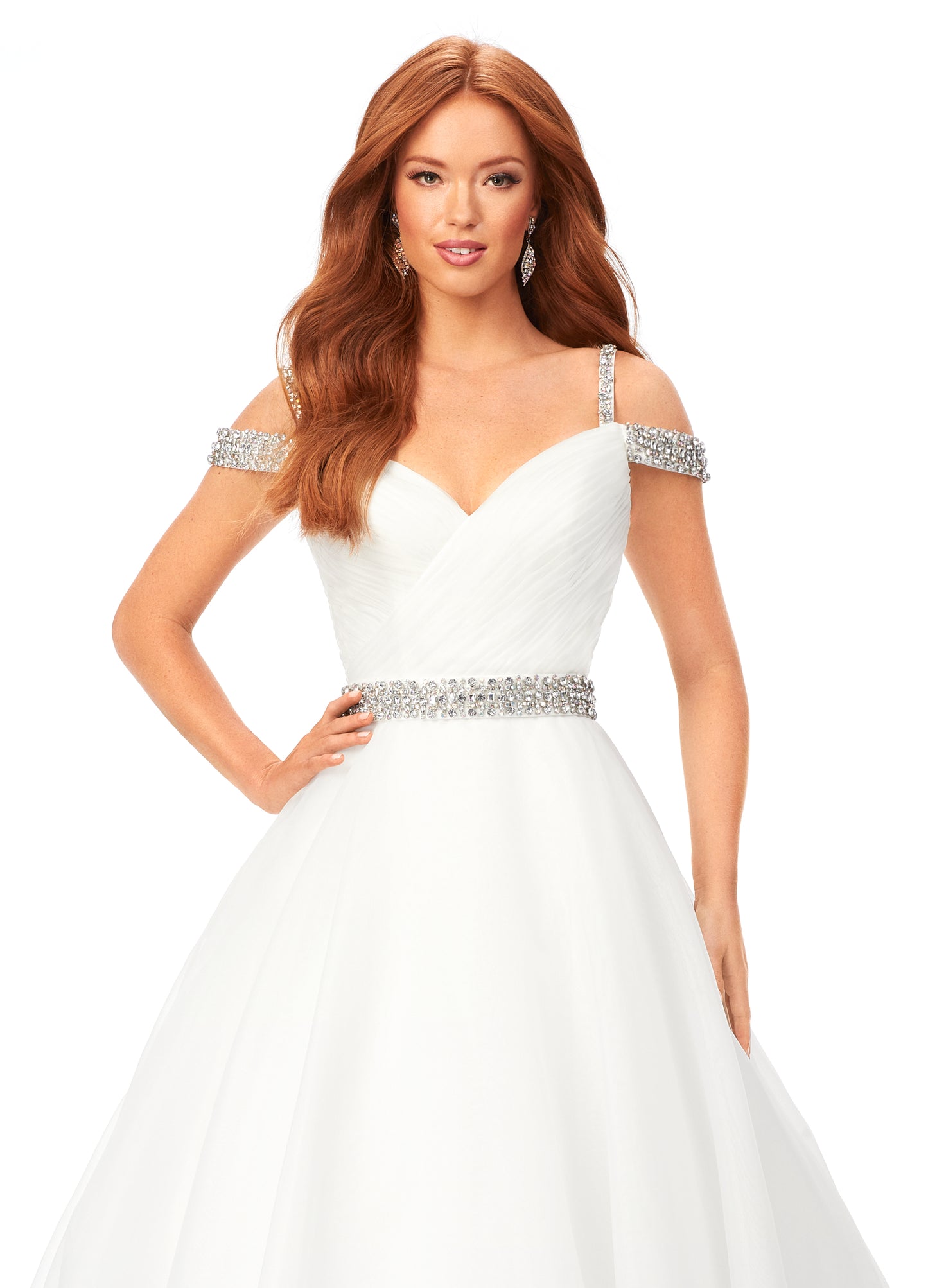 Ashley Lauren 11221 Dazzle in this off shoulder organza ball gown. The wrap bustier is complete with ruching and the spaghetti straps, off shoulder straps and belt are encrusted with rhinestones.