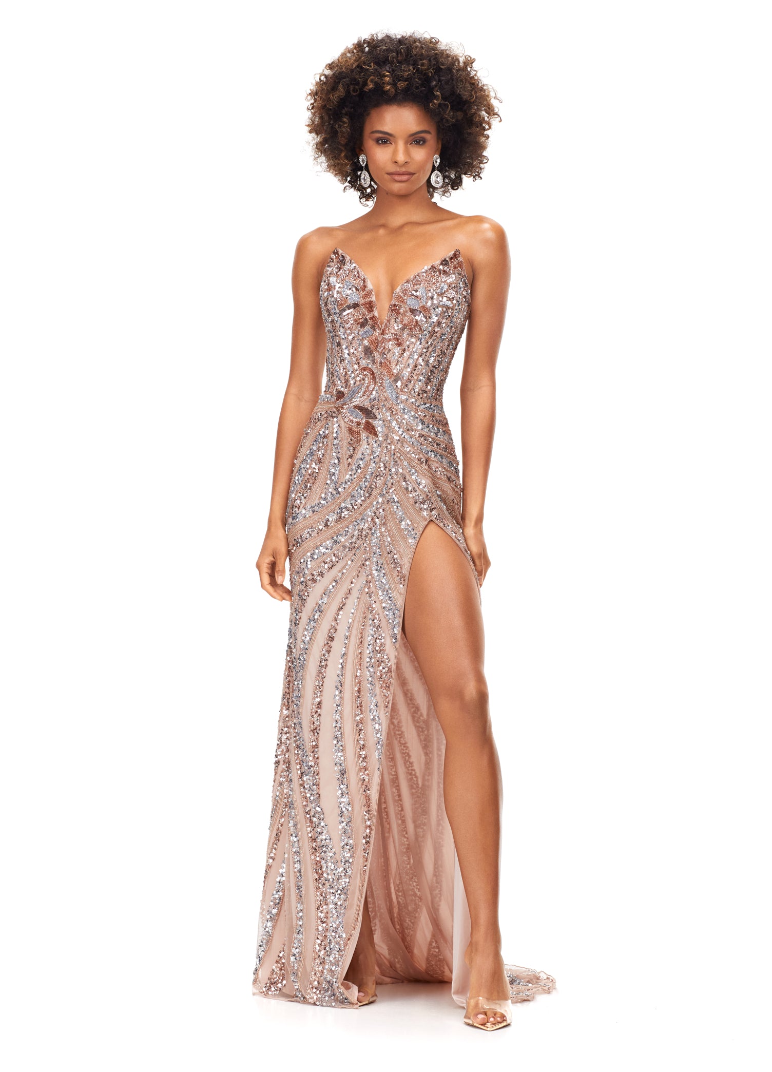 Ashley Lauren 11236 Long Fitted V Neck Slit Beaded Sequin Prom Dress Pageant Gown This strapless gown is sure to turn heads. The sweetheart neckline is complete with a modern floral sequin motif that continues down the bustier and skirt. The skirt is complete with a left leg slit. Strapless Bustier Left Leg Slit Fully Hand Beaded COLORS: Gold, Rose Gold, Gold/Black, Sky/Nude, Gold/Ivory, Fuchsia/Black, Purple, Red, Fuchsia, Bright Pink, Blue/Jade Sizes: 0-16